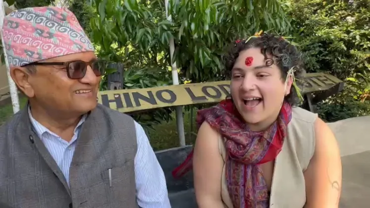 Foreign tourists in Sauraha receive Dashain tika and jamara