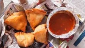 Experts Warn Against Serving Hot Food on Newspaper